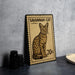 A metal stamp featuring a Savannah cat illustration, with the text "SAVANNAH CAT" and the denomination "20€".