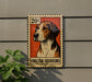 a metal sign with a picture of an English foxhound dog on it, mounted on a wall.