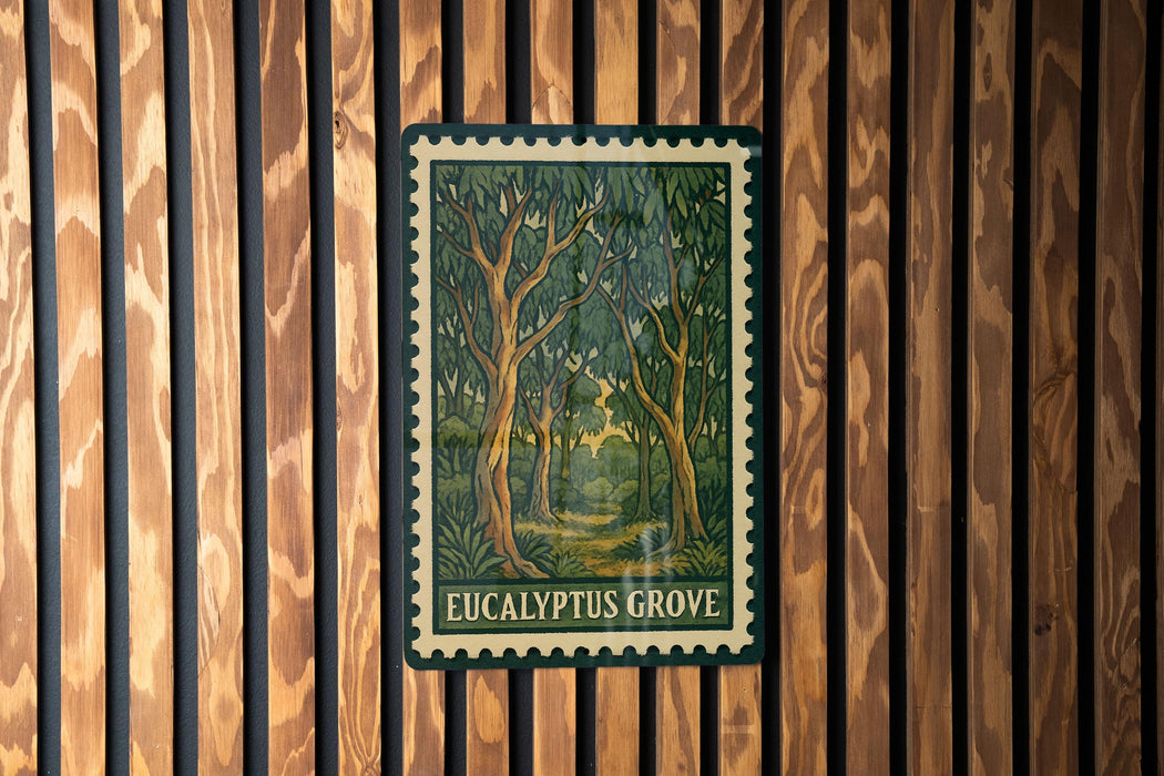 a framed illustration of a forest scene with the text "EUCALYPTUS GROVE" on the frame.