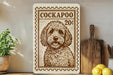 a wooden sign with a dog illustration, placed on a shelf next to a wooden cutting board and some lemons.