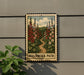 A framed illustration of a garden path with colorful flowers is displayed on a wall, accompanied by a potted plant to the left.