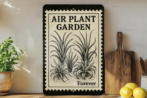 a vintage-style sign that reads "Air Plant Garden Forever" with illustrations of plants on it, placed on a shelf next to a wooden cutting board and some potted plants.