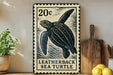 A 20c postage stamp featuring a sea turtle, placed on a wooden surface next to a wooden cutting board and some lemons.