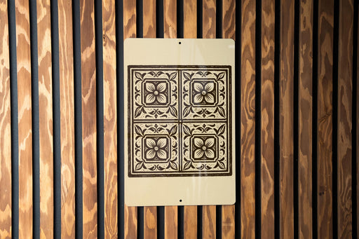 a decorative tile pattern on a wooden wall.