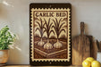 a wooden sign with a garlic bed illustration, surrounded by kitchen utensils and a potted plant on a shelf.
