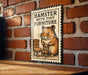 A sign featuring a hamster sitting on a chair, with the text "HAMSTER WITH TINY FURNITURE" displayed prominently.