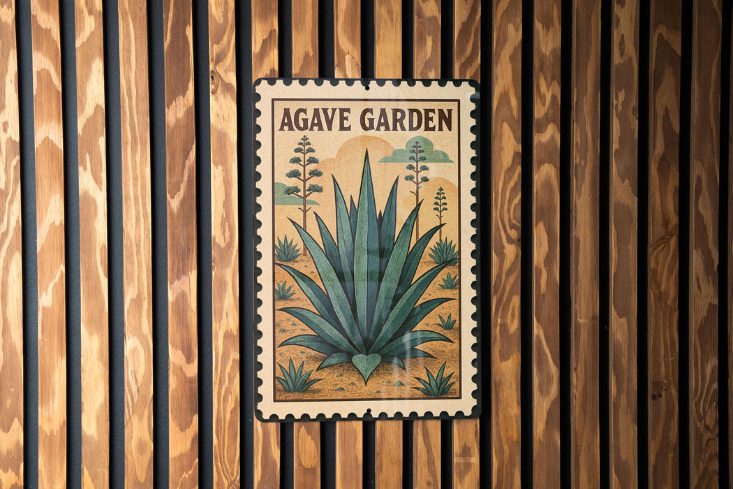 A framed image of an agave plant is displayed on a wooden wall.