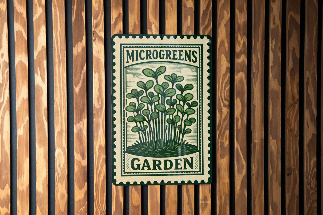 A metal sign with a green and white design, featuring a plant illustration, is mounted on a wooden wall.