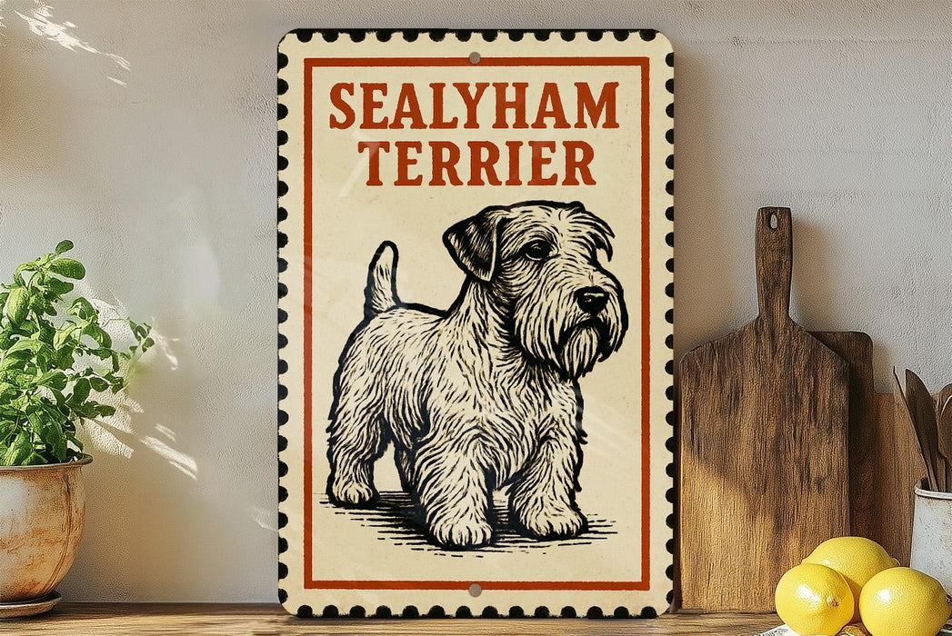 A metal sign with a drawing of a Sealyham Terrier dog, placed on a wooden surface next to a wooden cutting board and some lemons.
