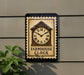 a clock with a farmhouse design, mounted on a wall.