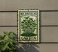 A sign for a "Microgreens Garden" is displayed on a wall, featuring a green plant illustration and the text "MICROGREENS GARDEN".