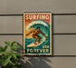 A vintage-style metal sign with a surfer riding a wave, mounted on a wall.