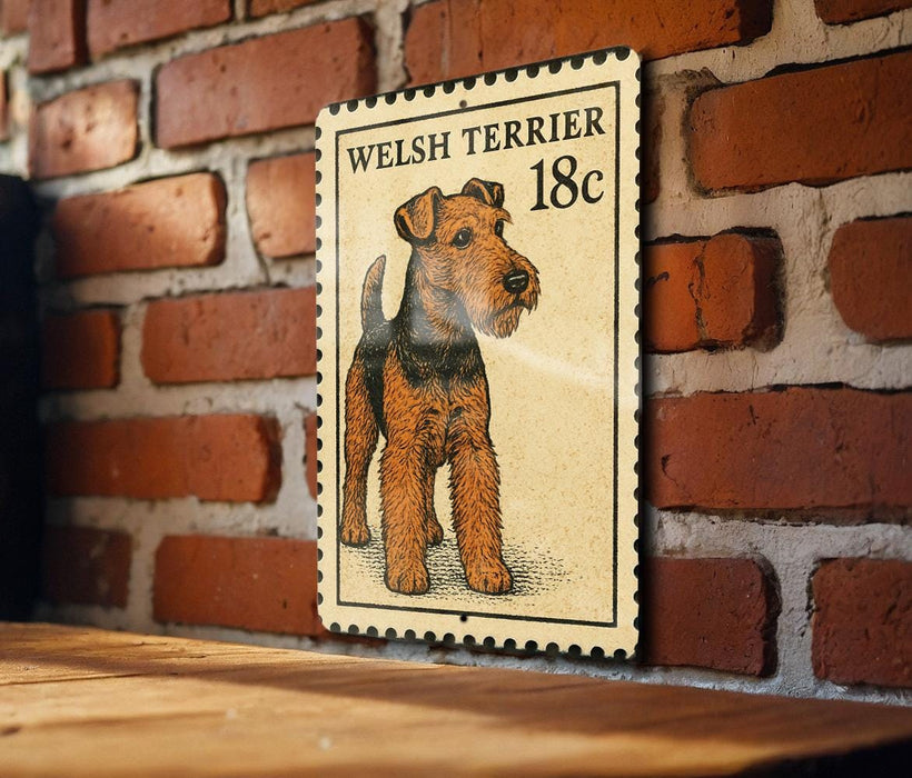 A Welsh Terrier dog is depicted on a postage stamp-like sign, mounted on a brick wall.