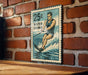 A vintage-style metal sign with a water skiing illustration is mounted on a brick wall.