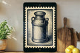 a black and white illustration of a milk can on a wooden surface, with a wooden cutting board and a potted plant to the left.