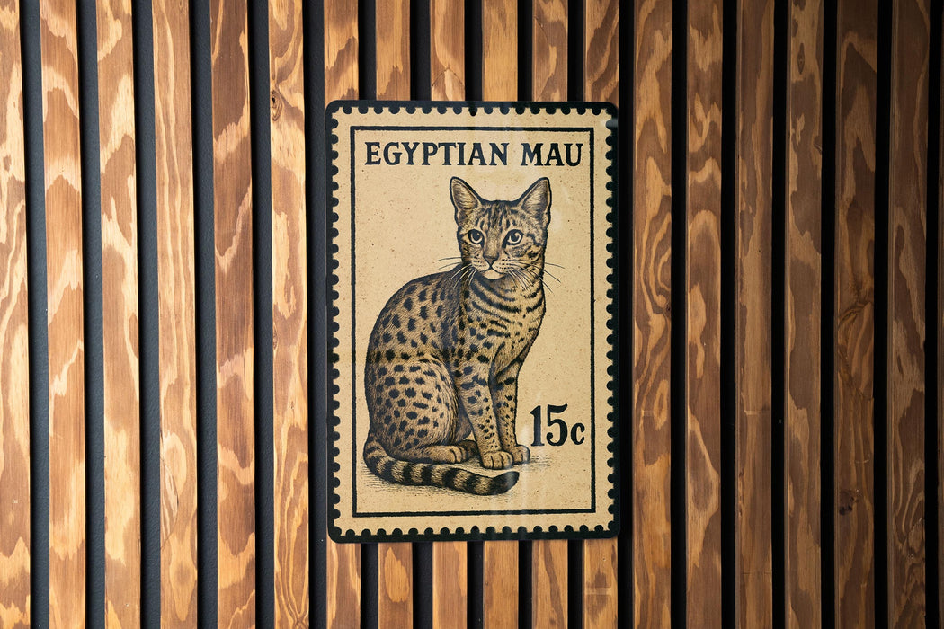 A postage stamp featuring an illustration of a spotted cat, with the text "EGYPTIAN MAU" and the value "15c".