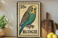 A vintage-style metal sign featuring a colorful illustration of a budgie bird, with the text "25c" and "BUDGIE" printed on it. The sign is displayed on a shelf next to a wooden cutting board and some potted plants.