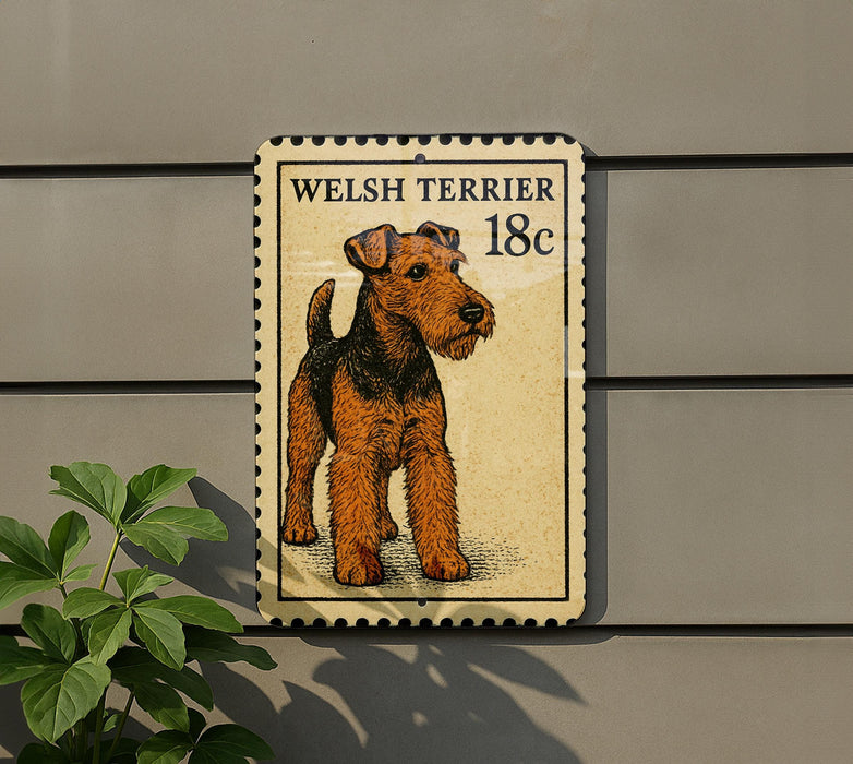 A Welsh terrier dog is depicted on a postage stamp-like sign, mounted on a wall.