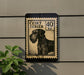 a black and white illustration of a dog, which appears to be a terrier breed, mounted on a wall.
