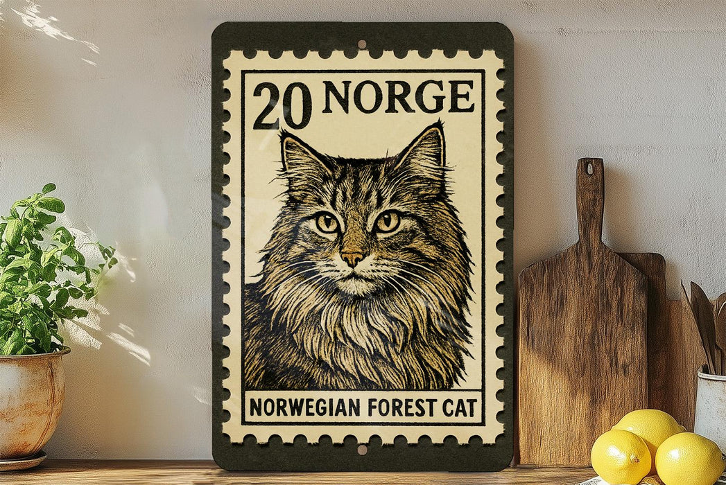 A wooden shelf displaying a framed image of a Norwegian forest cat, a postage stamp, and some kitchen utensils.