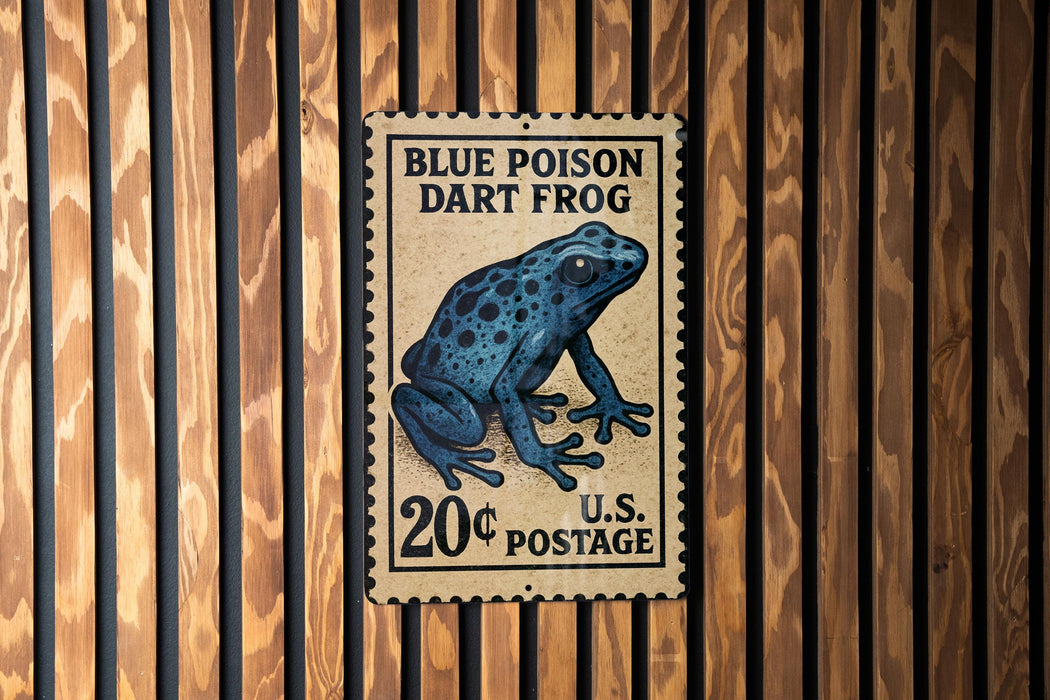 A blue poison dart frog postage stamp is displayed on a wooden wall.