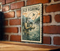 A vintage-style sign with a man fishing in a river, mounted on a brick wall.