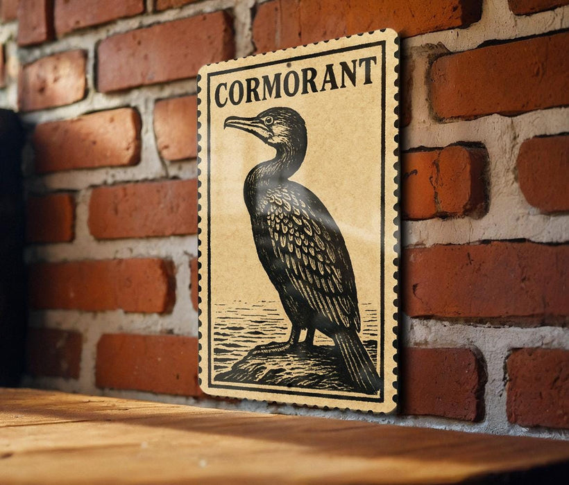 a wooden table with a framed illustration of a bird, specifically a cormorant, on the wall behind it.