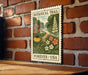 A vintage-style botanical trail stamp is displayed on a brick wall, featuring a lush, colorful illustration of flowers and plants.