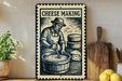 a vintage-style metal sign with a black and white illustration of a man making cheese, surrounded by various kitchen utensils and ingredients.