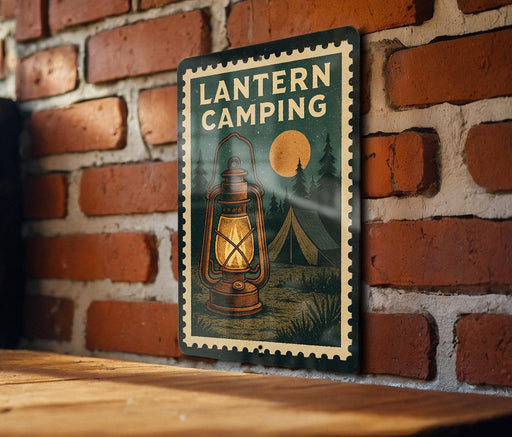 A lantern camping sign is displayed on a brick wall, featuring an illustration of a lantern and a tent in a wooded area.