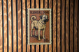 A brown and black dog illustration on a brown and black postage stamp.