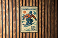 A vintage-style postage stamp featuring a snowboarder on a mountain slope, with the text "SNOWBOARDING" and "USA 10c" printed on it.