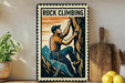 A vintage-style metal sign with a man climbing a rock, accompanied by a wooden cutting board and a potted plant.