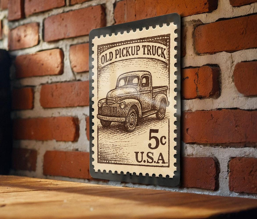 A vintage-style stamp depicting an old pickup truck, mounted on a brick wall.