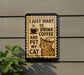 a sign with a cat and the text "I JUST WANT TO DRINK COFFEE AND PET MY CAT".