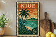 A vintage-style metal stamp with a tropical landscape design, featuring palm trees, a sunset, and a body of water.