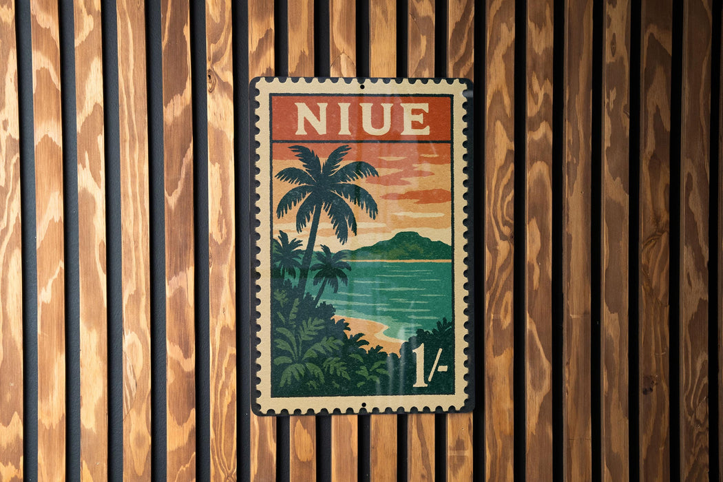 A vintage-style postage stamp featuring a tropical landscape with palm trees and a sunset over a body of water.