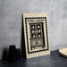 a China Cabinet sign with a black and white illustration of a cabinet and various kitchen items.