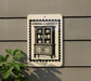 a sign with a black and white illustration of a China cabinet, mounted on a wall.
