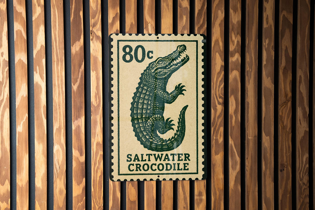 A postage stamp featuring a crocodile, with the text "80c" printed on it.