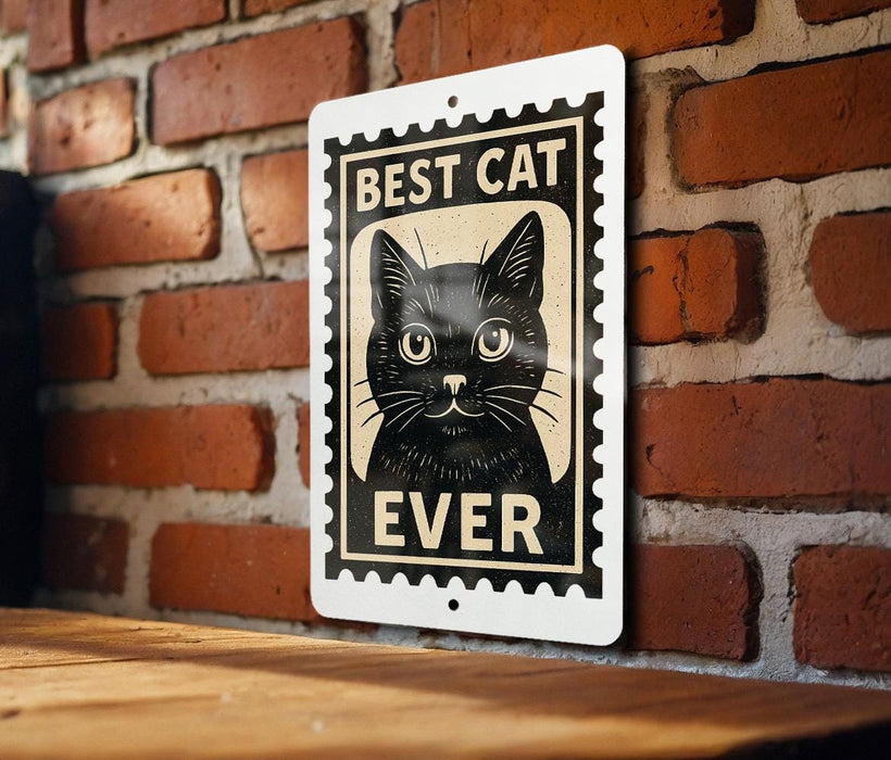 A sign with a black cat on it, mounted on a brick wall.