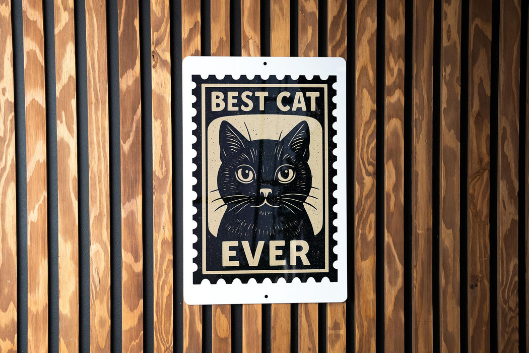 A metal sign with a black cat illustration and the text "BEST CAT EVER" is displayed on a wooden wall.