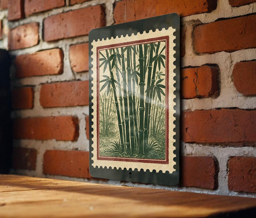 A framed image of bamboo plants is hanging on a brick wall.