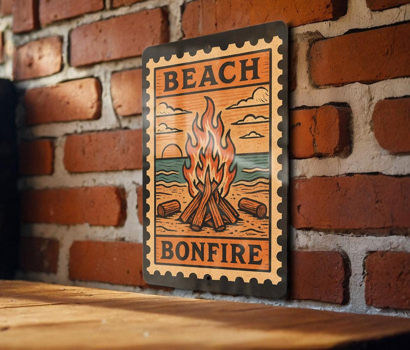 A metal sign with a beach and bonfire design is mounted on a brick wall.