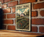 A vintage-style metal sign with a farm scene and a barn, mounted on a brick wall.