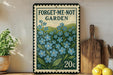a vintage-style metal sign with a floral design, placed on a wooden surface next to a wooden cutting board and some potted plants.