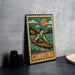 A vintage-style metal sign featuring a man kayaking in a river, with a sun and clouds in the background.