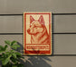 a sign with a red border and a picture of a dog, mounted on a wall.