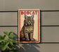 a sign with a picture of a bobcat, a type of wild cat, mounted on a wall.