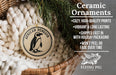 Ceramic ornaments featuring a penguin design, with a wicker basket and greenery in the background.